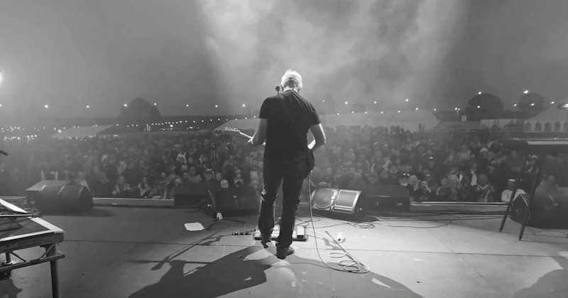 photo of This is Floyd's lead guitarist playing to the large festival ausience